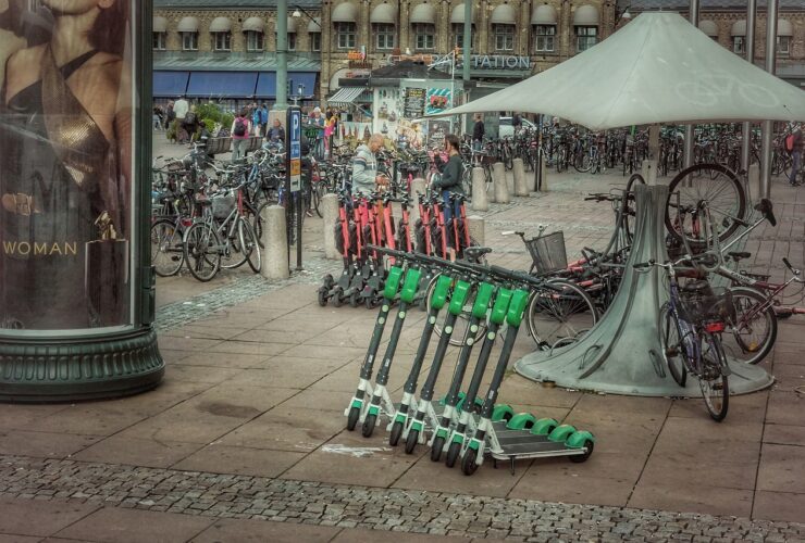 Electric scooters parked in a row